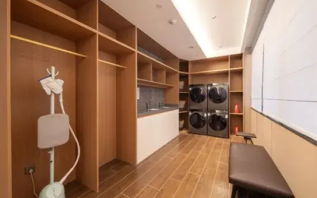 BaiLiQuanZhiJiuDian Hotel (Jiangmen Binjiang Sports Center)