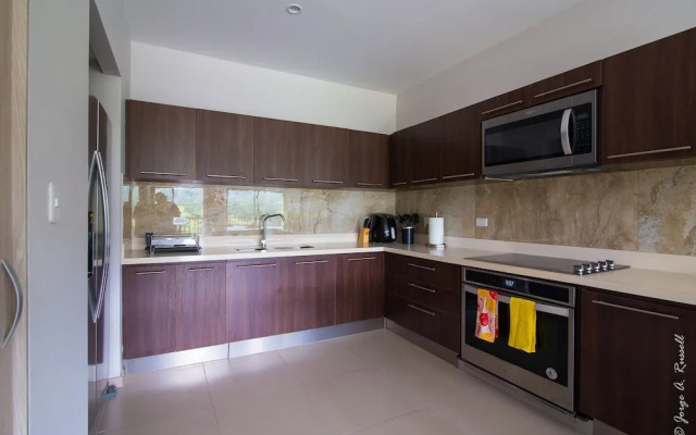 Luxurious and Warm Condo Just Step From the Beach!