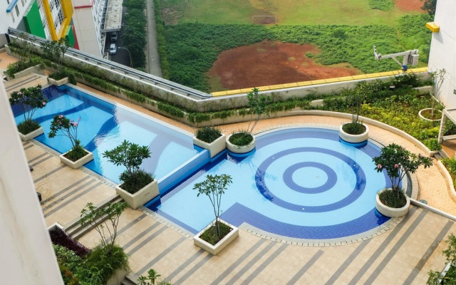 Minimalist Studio at Bassura City Apartment By Travelio