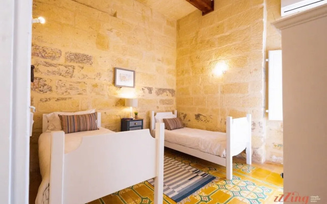 A Stunning Gozo Farmhouse With a Large Pool