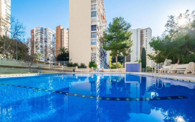 Apartamento con piscina y garaje, Playa a 10 min