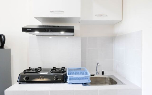 Modern And Homey 2Br At Puncak Kertajaya Apartment