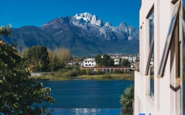 EARTHGAZE•STARSPANNG: 180-Degree Snow Mountain View Homestay (Lijiang Ancient Town Branch)