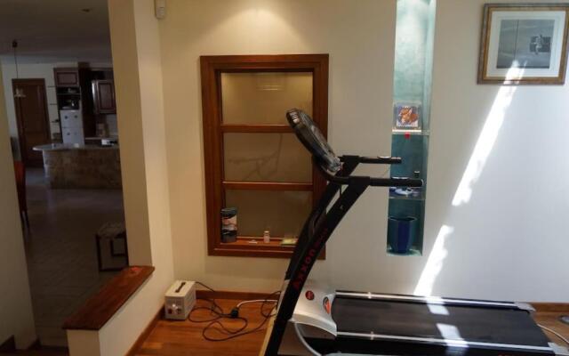 Apartment with a garden, BBQ, swimming pool and jacuzzi
