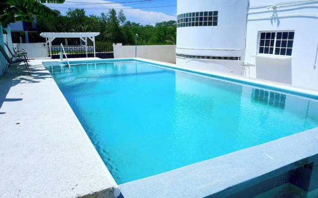See Belize Waterside Sea View 2-bedroom Apartment w Balcony, Pool & Deck 2nd FL