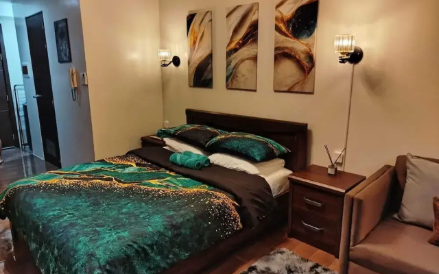Air Residences-Modern studio w/ City skyline view