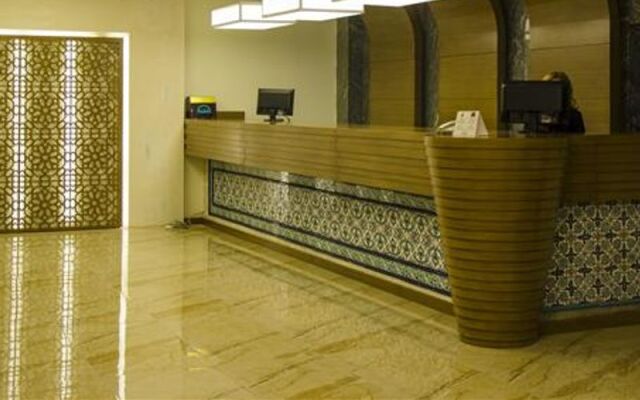 Tilmen Hotel
