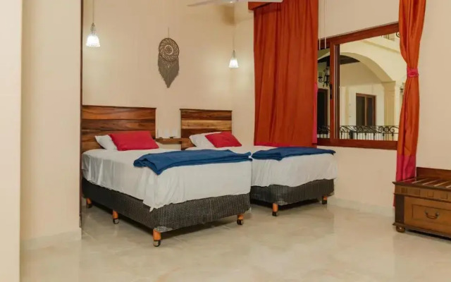 hotel y hostal nojoch che
