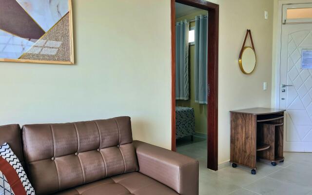 2 QUARTOS em CONDOMÍNIO TRANQUILO com PISCINA Estacionamento coberto  PARQUINHO para CRIANCAS - Cozinha Completa, VENTILADO, nascente, AR CONDICIONADO  800m da praia do PORTO DAS DUNAS e BEACH PARQUE - Ceará