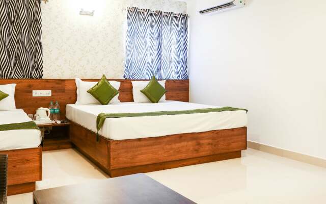 Treebo Comforts Inn, University Road Deralakatte