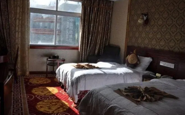 Shangri-La Zhenglong Holiday Hotel