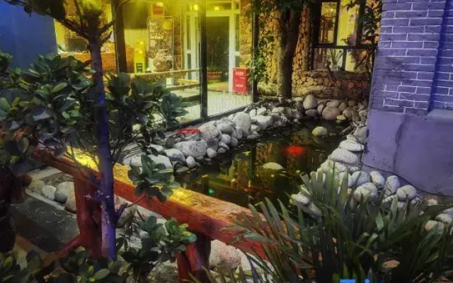 Tukes Ligong Be Courtyard Homestay Reception Center