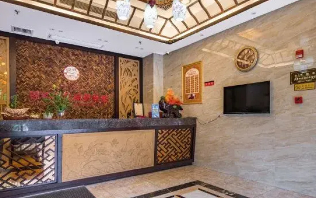 Jinxiu Zhixing Business Hotel