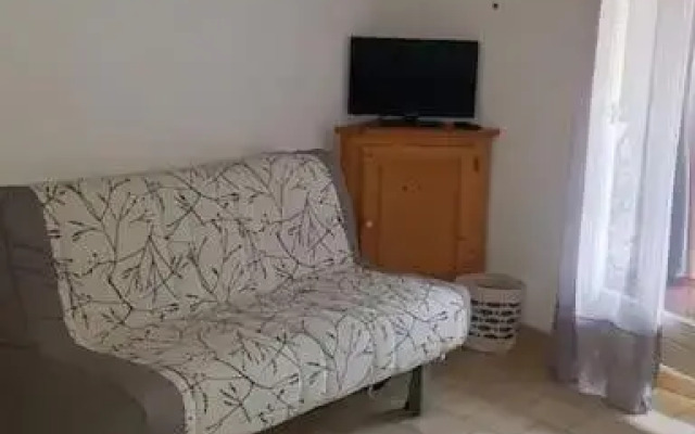 Studio cabine climatisé rez de jardin plage 150m Boucanet