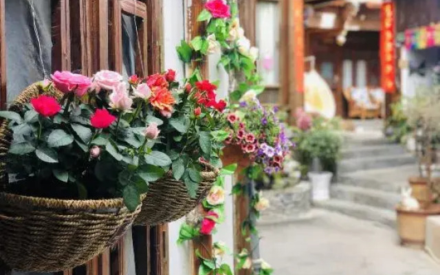 Floral Hotel·Yunjing Zhinan Hotel(Dayan Gucheng dashuiche store)