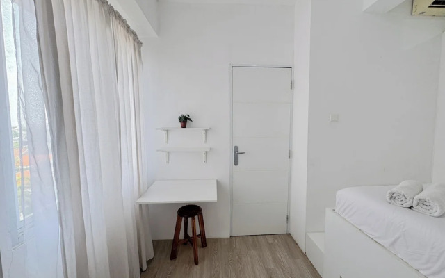 Compact and Restful 2BR at Menara Rungkut Apartment