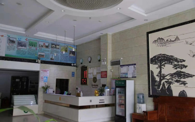 Q+ Nanxiong Xinhewan Business Hotel