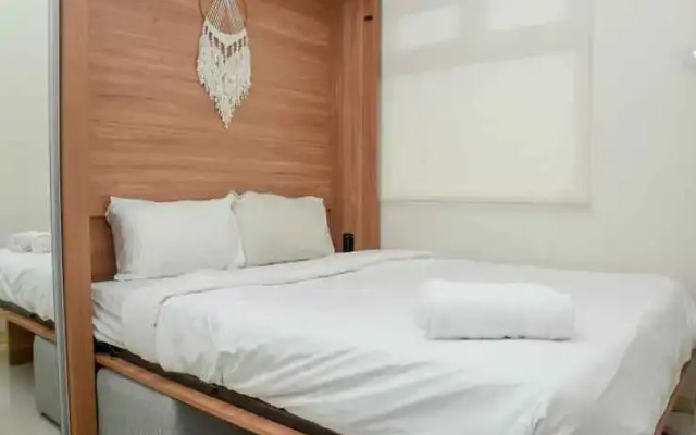 2BR Green Pramuka City Apartment by Travelio