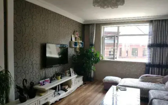 Benxi Huamu Hefu Warm Apartment