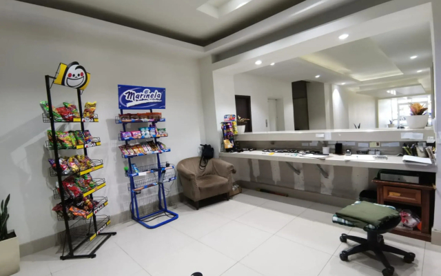 Capital O Baja Place Inn