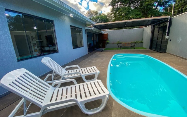 Casa Central piscina e AC para 8 hospede
