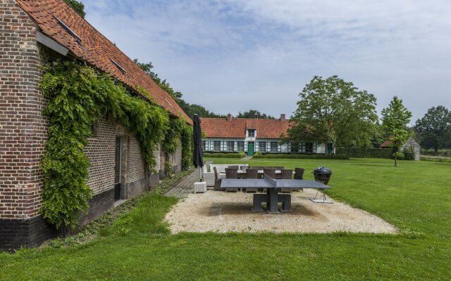 beautifull renovated farmhouse with traditional elements and a big garden