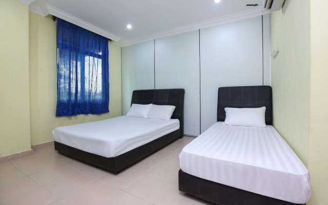 SPOT ON 89857 Azra Inn Rumah Tumpangan