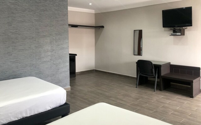 Capital O Palms Hotel