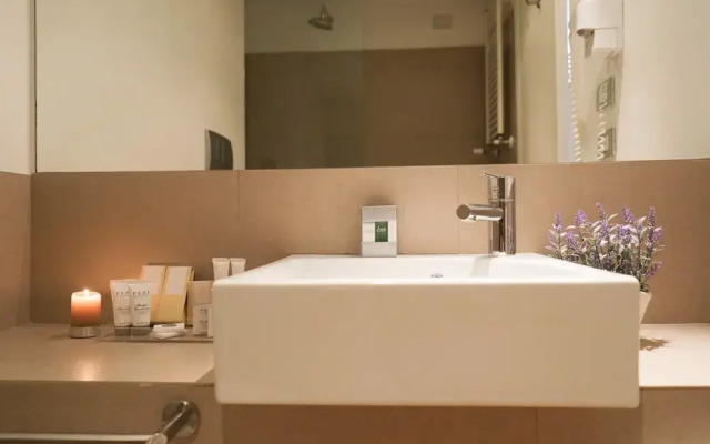 Welc-om Specola Suite Apartment