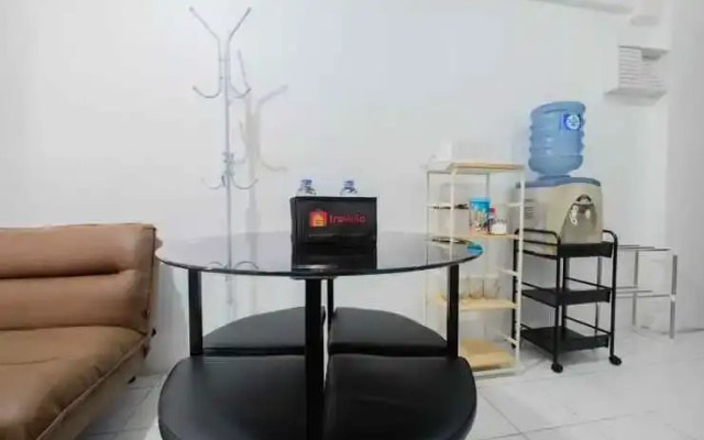 New Furnished 2BR at Mutiara Bekasi Apartment By Travelio