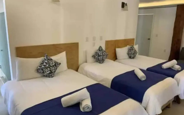 Capital O Hotel Arena Beach Club