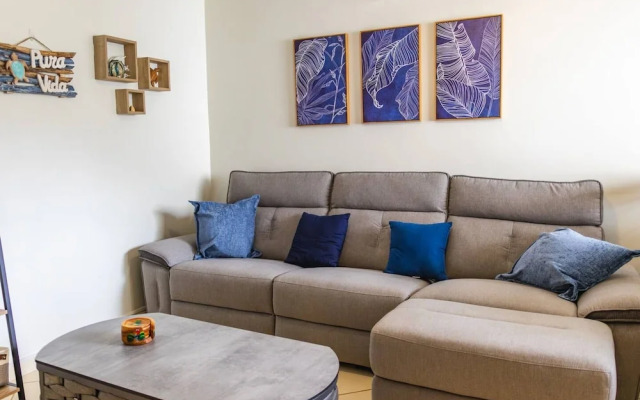 Cozy Condo with Panoramic Hillside Views from Rooftop Terrace and Short Walk to Beach