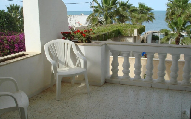 Partie de pittoresque maison en bord de mer