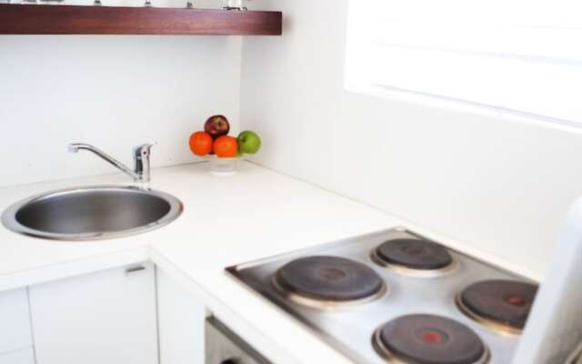 Chic White Studio Apartment