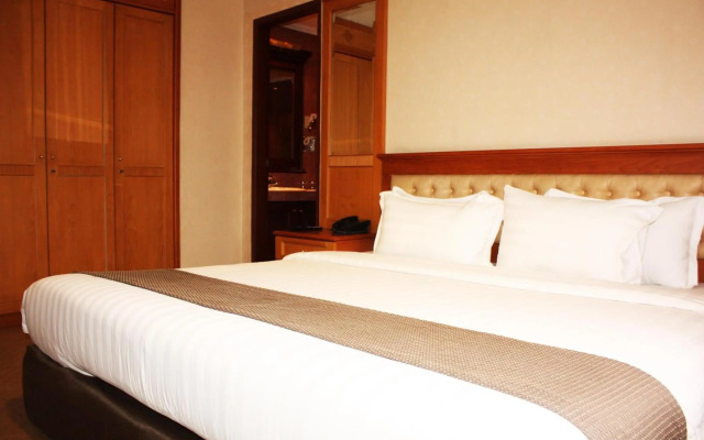 Travellers Suites Serviced Apartments
