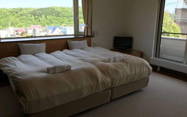 Tsuru Apartments – Guest Rooms – Furano