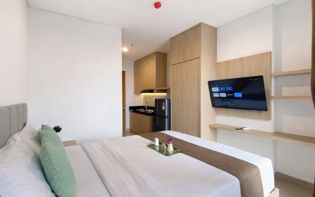 Homey Wooden Touch Studio At Apartment Ciputra World 2 – Guest Rooms – Jakarta