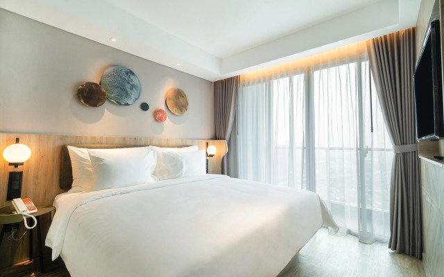 HARRIS Suites Puri Mansion