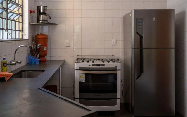 Casa com forno de pizza e vista para as montanhas