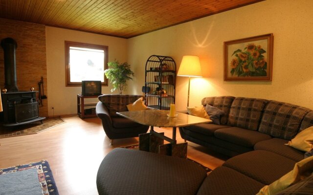 Wooden bungalow with oven, in Oberharz near a lake