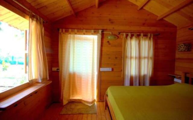 Pele's Windsong Wood Cottage on the beach