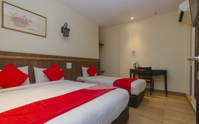 Super OYO 596 The Vintage Hotel
