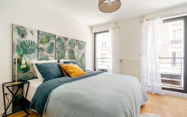 3 p 60 M2 Lesapparts Paris-Clichy terrasse équipée et wifi gratuit