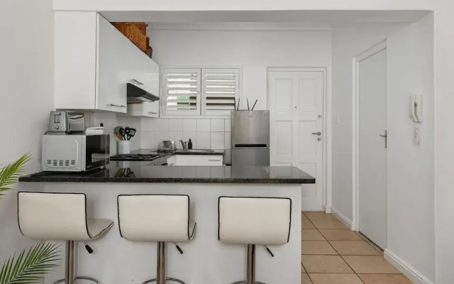 Stylish Sea Point Studio in Secure Complex Patio