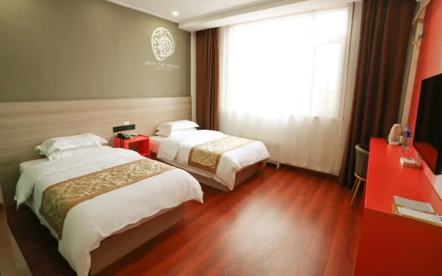 Shell Xinzhou Xinfu District Railway Station Hotel