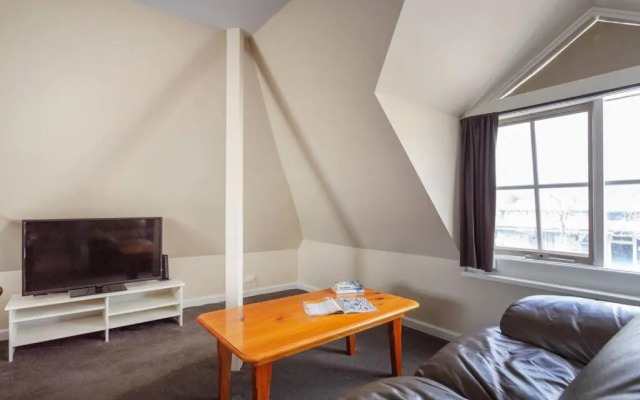 Upstairs Studio Apartment with street access