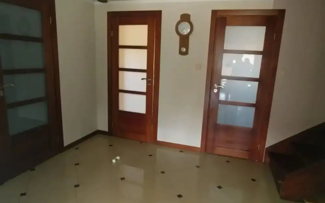 Rustic Riverside Cabin in Forest