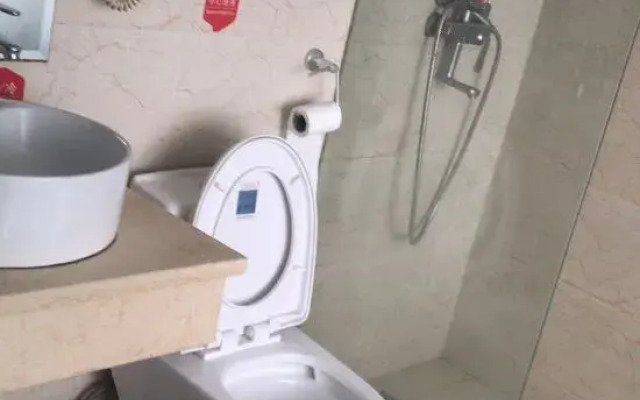 99 Xinyi Hotel (Shanghai Jiuxin Highway Shop)