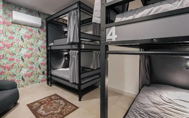 Bed in mixed room near Coyoacan
