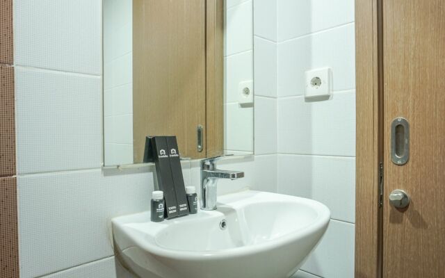 Warm and Cozy Studio at Puri Orchard Apartment